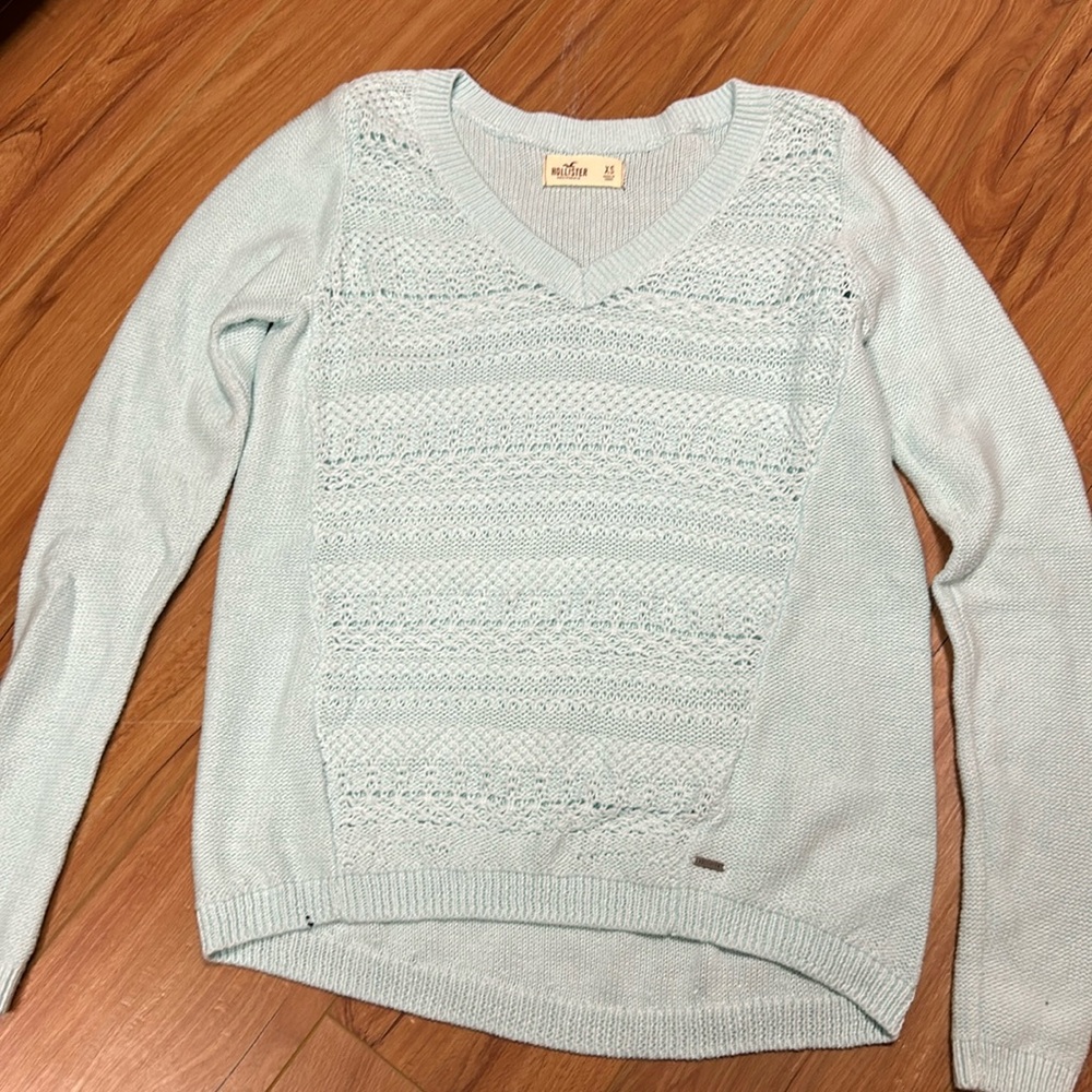 Hollister V-neck sweater. Size XS, light blue in color